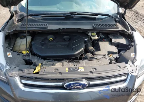 2015 Ford Escape Titanium z USA, uszkodzony, nr VIN 1FMCU9J96FUB11569